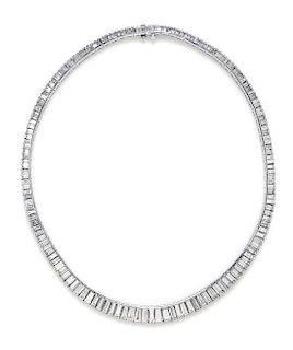 A Platinum and Diamond Riviera Necklace, 31.70 dwts.