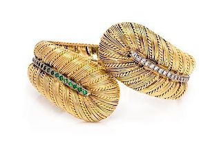 A Yellow Gold, Diamond and Emerald Bypass Bracelet, 46.00 dwts.