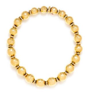 An 18 Karat Yellow Gold Bead Necklace, David Webb, 141.30 dwts.