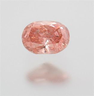 A 0.53 Carat Oval Cut Fancy Intense Pinkish Orange Diamond,