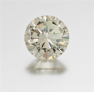* A 6.27 Carat Round Brilliant Cut Diamond, 11.80 dwts.