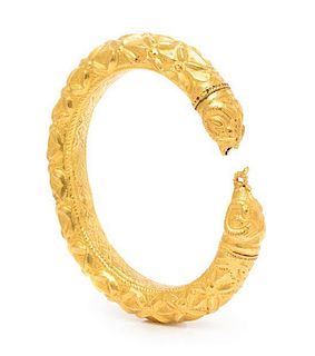 * An Ancient Gold Rams Head Bangle Bracelet, 26.50 dwts.