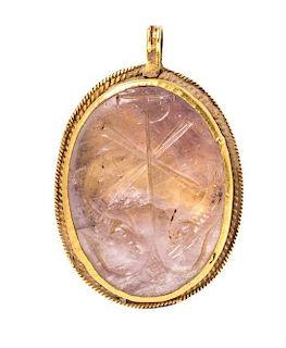 * An Early Christian Yellow Gold and Rock Crystal Intaglio Pendant, 9.60 dwts.