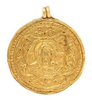 * A High Karat Yellow Gold Byzantine Era Medallion/Pendant, 17.41 dwts.