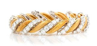 A Platinum, 18 Karat Yellow Gold and Diamond Bracelet, Ruser, 40.00 dwts.
