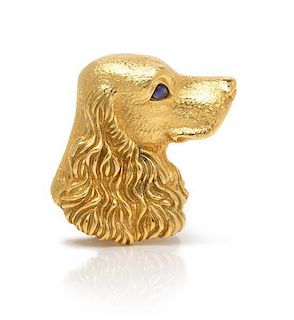 An 18 Karat Yellow Gold and Sapphire Dog Brooch, Tiffany & Co., Circa 1989, 6.40 dwts.
