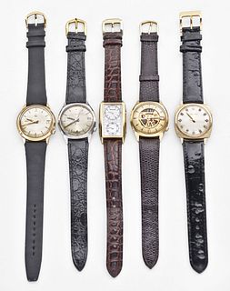 A lot of five electric wrist watches including four Accutron