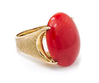 * An 18 Karat Yellow Gold and Coral Ring, 8.80 dwts.