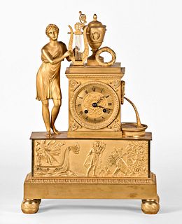 An early 19th century French figural mantel clock featuring Orpheus