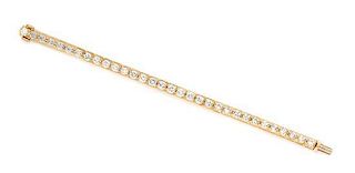 A Yellow Gold and Diamond Line Bracelet, 21.80 dwts.