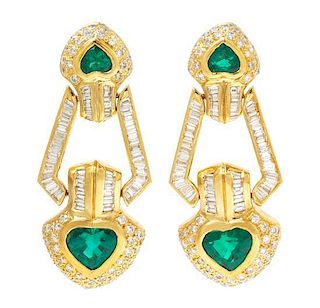 * A Pair of 18 Karat Yellow Gold, Emerald and Diamond Pendant Earclips, 18.40 dwts.