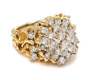 * An 18 Karat Bicolor Gold and Diamond Ring, 13.00 dwts.