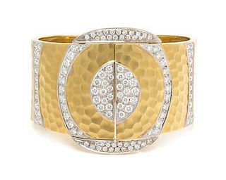 * An 18 Karat Bicolor Gold and Diamond Bracelet, 69.00 dwts.