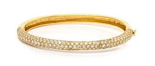 An 18 Karat Yellow Gold and Diamond Bangle Bracelet, 13.60 dwts.
