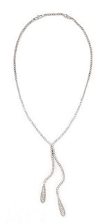 An 18 Karat White Gold and Diamond Lariat Necklace, 19.60 dwts.