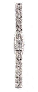 * An 18 Karat White Gold and Diamond "Avenue" Wristwatch, Harry Winston, 64.40 dwts.