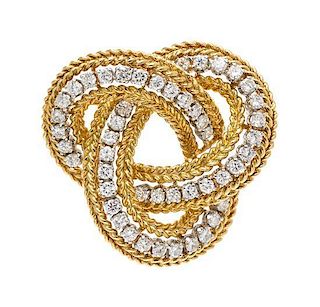 * A Yellow Gold, Platinum and Diamond Knot Motif Brooch, French, 11.50 dwts.