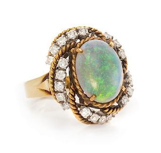 A Yellow Gold, Opal and Diamond Ring, 6.20 dwts.