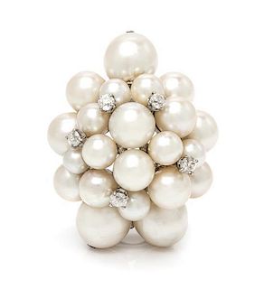 A White Gold, Cutured Pearl and Diamond Brooch, Seaman Schepps, 14.80 dwts.