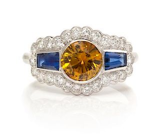 An 18 Karat White Gold, Colored Diamond, Sapphire and Diamond Ring, 2.70 dwts.