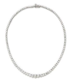 * An 18 Karat White Gold and Diamond Riviera Necklace, 21.85 dwts.