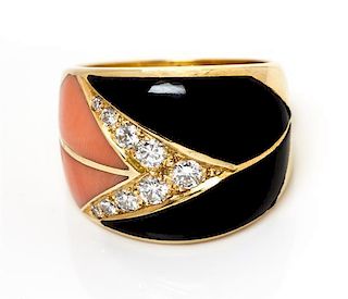 An 18 Karat Yellow Gold, Diamond, Onyx, and Coral Ring, Cartier, 6.70 dwts.