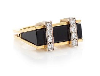 A Bicolor Gold, Diamond and Onyx Ring, 8.90 dwts.