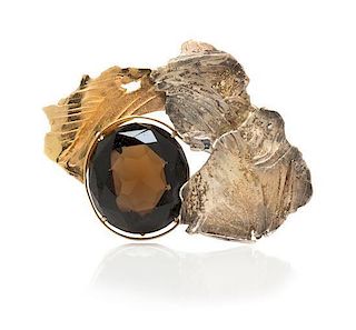 A Bicolor Gold and Smokey Quartz Brooch, Eve Alfille, 25.20 dwts.