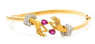 * An 18 Karat Yellow Gold, Diamond and Ruby Hand Motif Bracelet, Carrera y Carrera, 12.80 dwts.