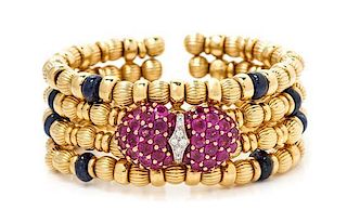 * An 18 Karat Yellow Gold, Sapphire, Ruby and Diamond Cuff Bracelet, Elan, 50.35 dwts.