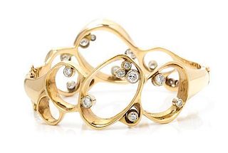 * A Yellow Gold and Diamond Bangle Bracelet, 29.20 dwts.