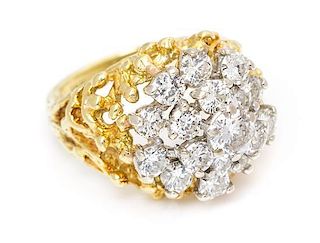 * A Bicolor Gold and Diamond Cluster Ring, 8.40 dwts.