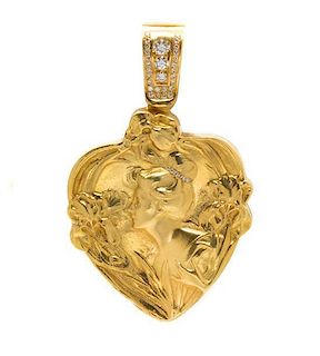 * An 18 Karat Yellow Gold and Diamond Heart Shape Locket, 64.00 dwts.