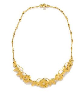 * An 18 Karat Yellow Gold and Diamond Floral Motif Necklace, 22.00 dwts.