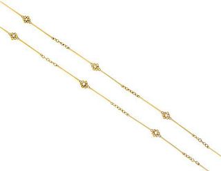 A Yellow Gold and Diamond Flower Motif Necklace, 11.80 dwts.