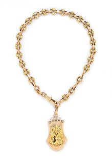 A Victorian 18 Karat Bicolor Gold Fob Locket and Chain, French, 29.10 dwts.