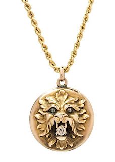 * An Art Nouveau Diamond and Lion Head Locket Pendant with Chain, 21.60 dwts.