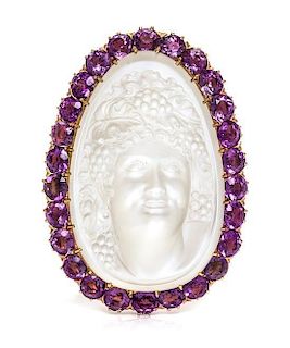 A Carved Moonstone Cameo and Amethyst Pendant/Brooch, 13.40 dwts.