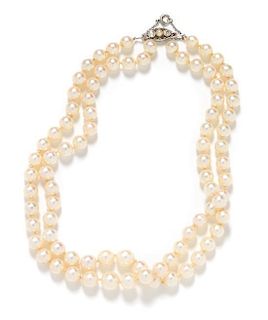 A Platinum, Diamond and Double Strand Graduated Cultured Pearl Necklace,