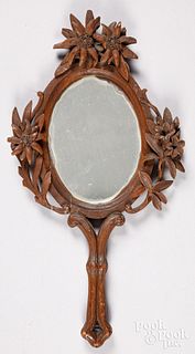 Intricately carved hand mirror, ca. 1900