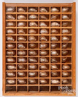 Collection of carved souvenir Cowrie shells
