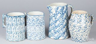 Four blue and white spongeware pitchers, ca. 1900