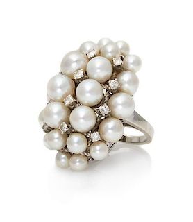 * A 14 Karat White Gold, Cultured Pearl and Diamond Cluster Ring, 10.90 dwts.