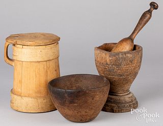 Mortar and pestle together with a tankard and bowl