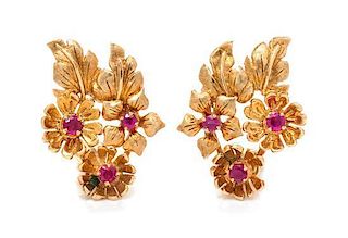 * A Pair of 14 Karat Rose Gold and Ruby Floral Motif Earclips, 4.90 dwts.