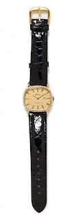 A 14 Karat Yellow Gold and Diamond Wristwatch, Geneva,