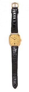 An 18 Karat Yellow Gold Wristwatch, Baume & Mercier,