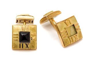 * A Pair of 18 Karat Yellow Gold and Onyx "Atlas" Cufflinks, Tiffany & Co., Italy, 13.80 dwts.