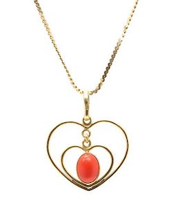 A 14 Karat Yellow Gold and Coral Heart Motif Necklace, 2.50 dwts.