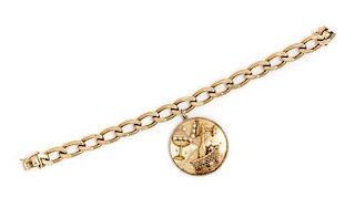 A 14 Karat Yellow Gold Charm Bracelet with Attached Champagne Motif Charm, 35.00 dwts.